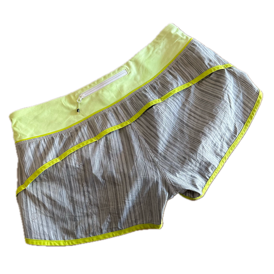 Short 8 amarillo para running
