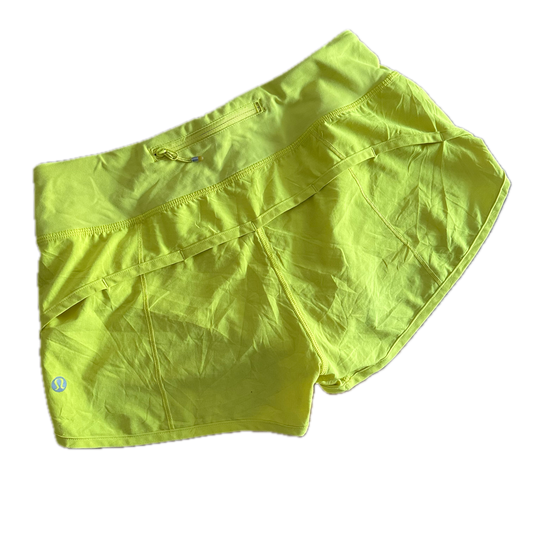Short 4 amarillo para running
