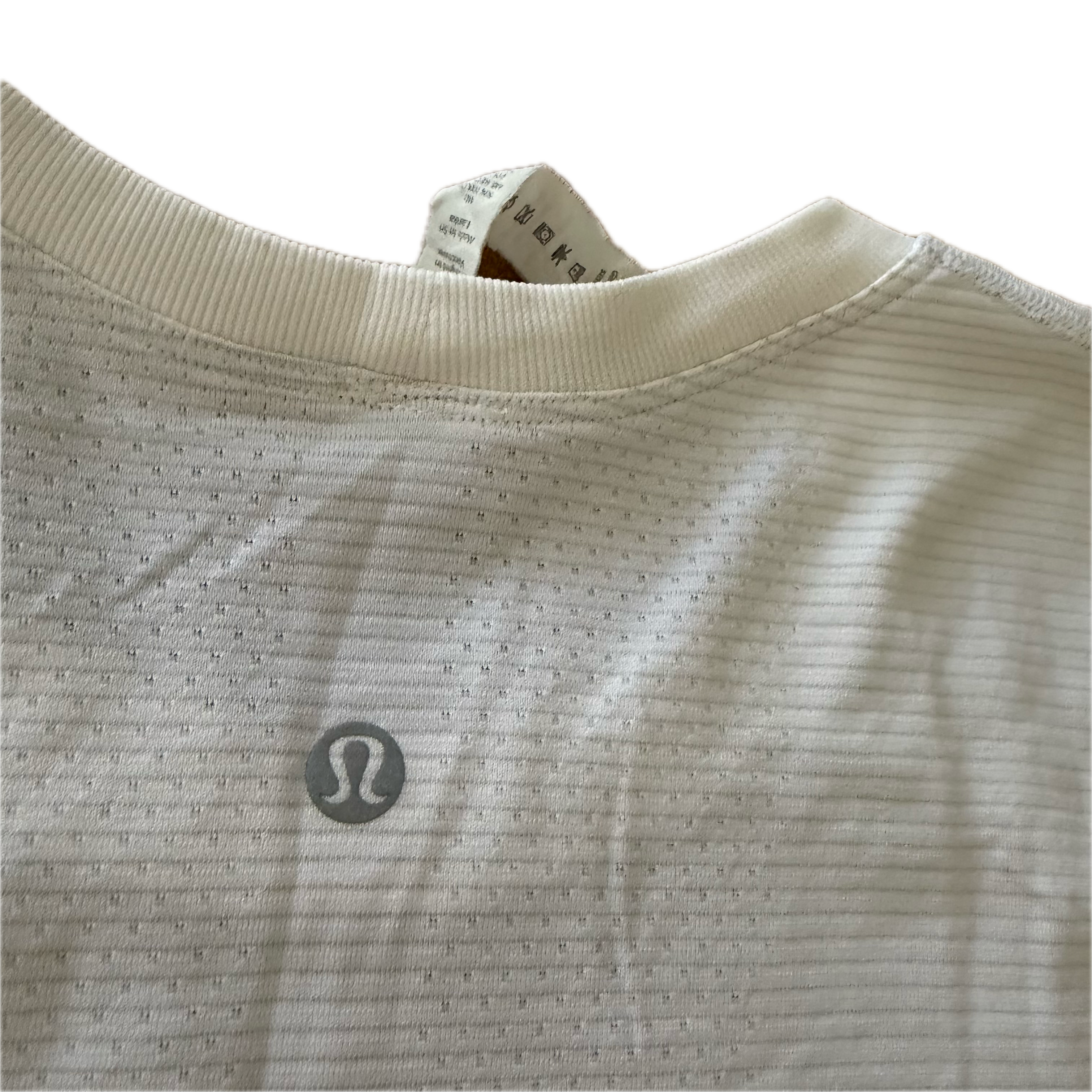 Playera Lululemon talla 6 color blanco tela Silverescent™
