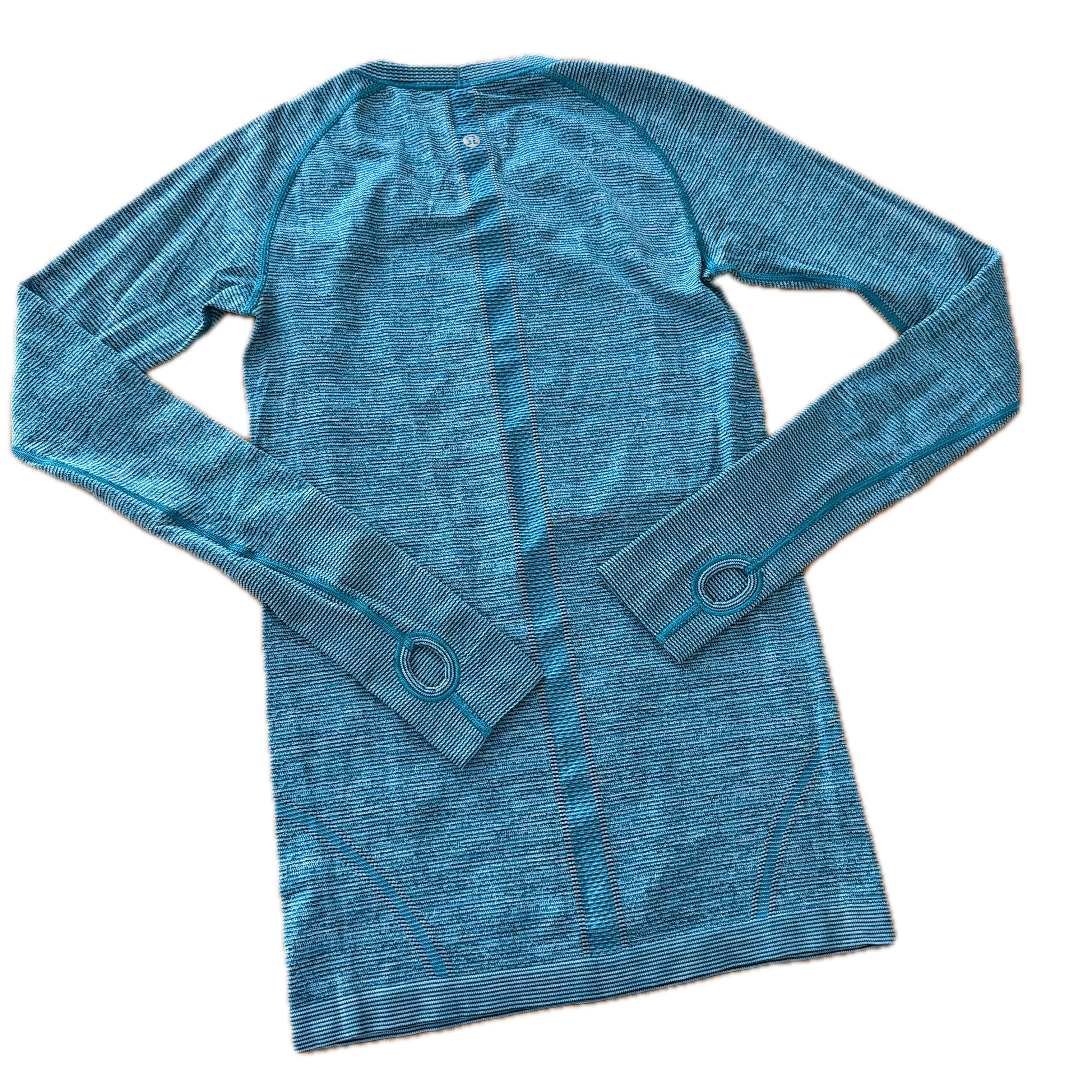 Playera Lululemon talla 6 color azul jaspeado tela Silverescent™