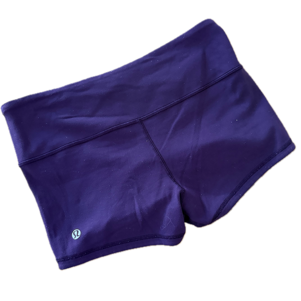 Short licra talla 6 negro y morado (reversible)