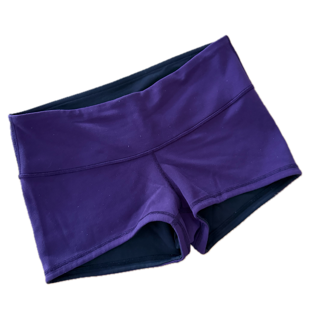 Short licra talla 6 negro y morado (reversible)