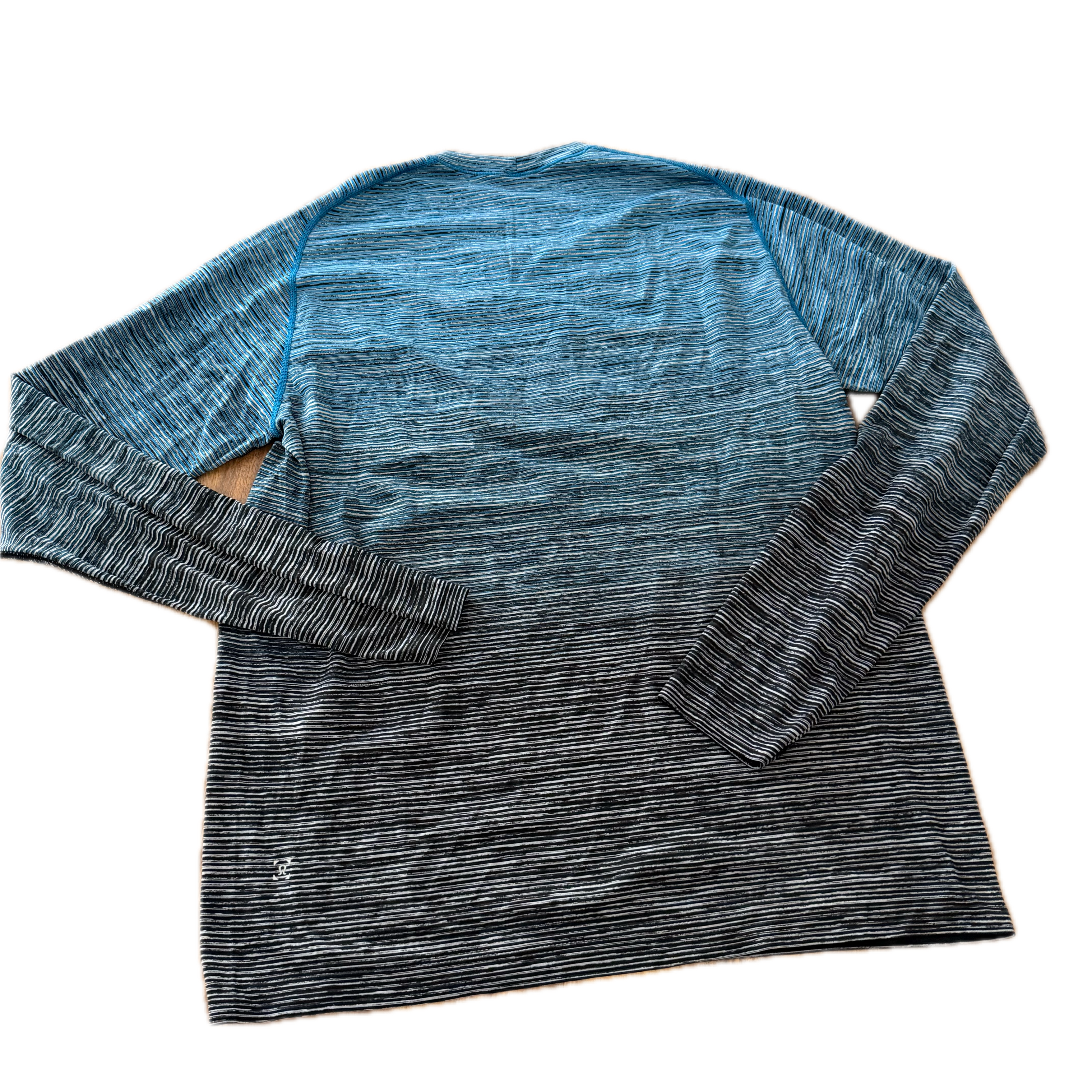 Playera Lululemon talla 12 color gris tela Silverescent™