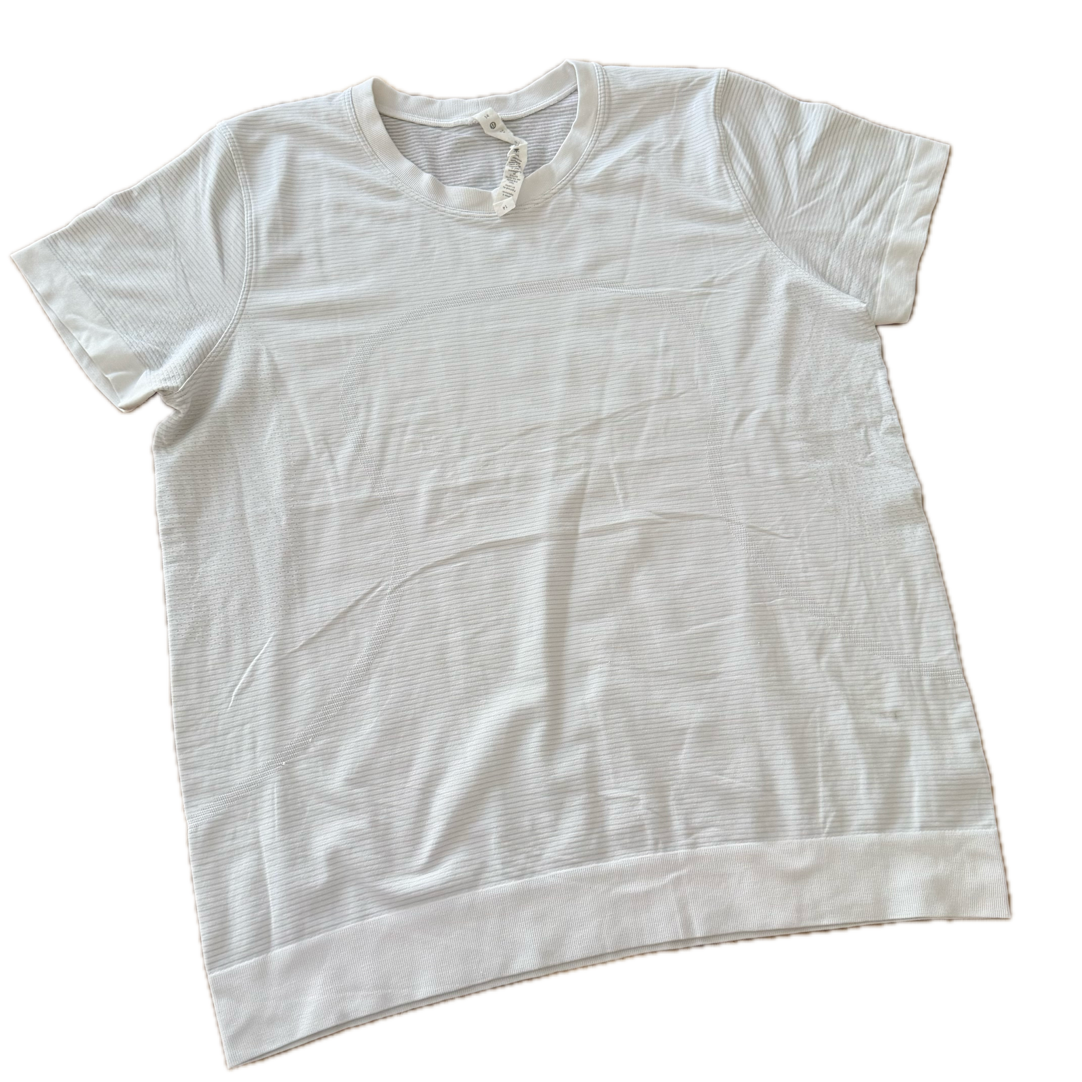 Playera Lululemon talla 14 color blanco tela Silverescent™