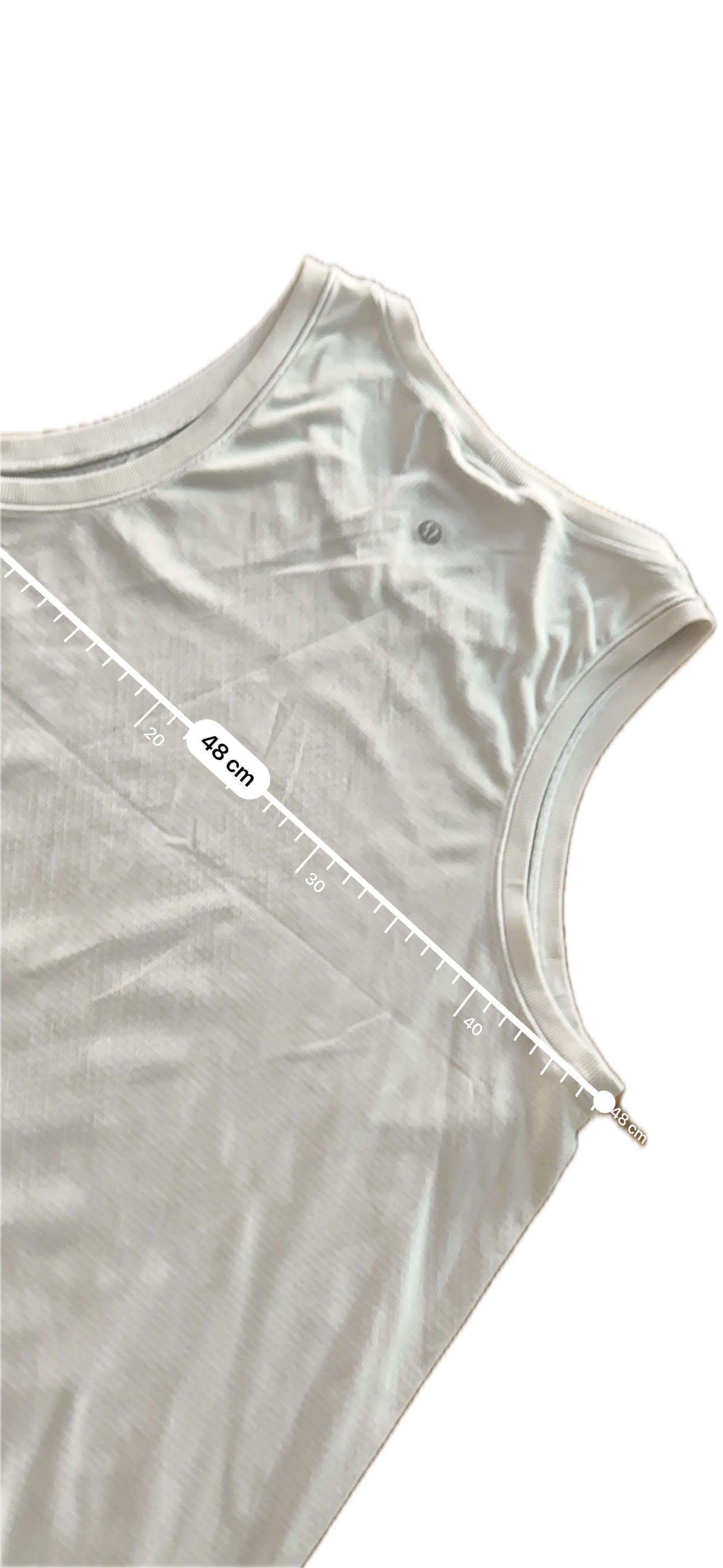 Tank Lululemon talla L blanca con hoyitos