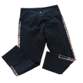Legging talla 6 negro con diseño lateral en rosas
