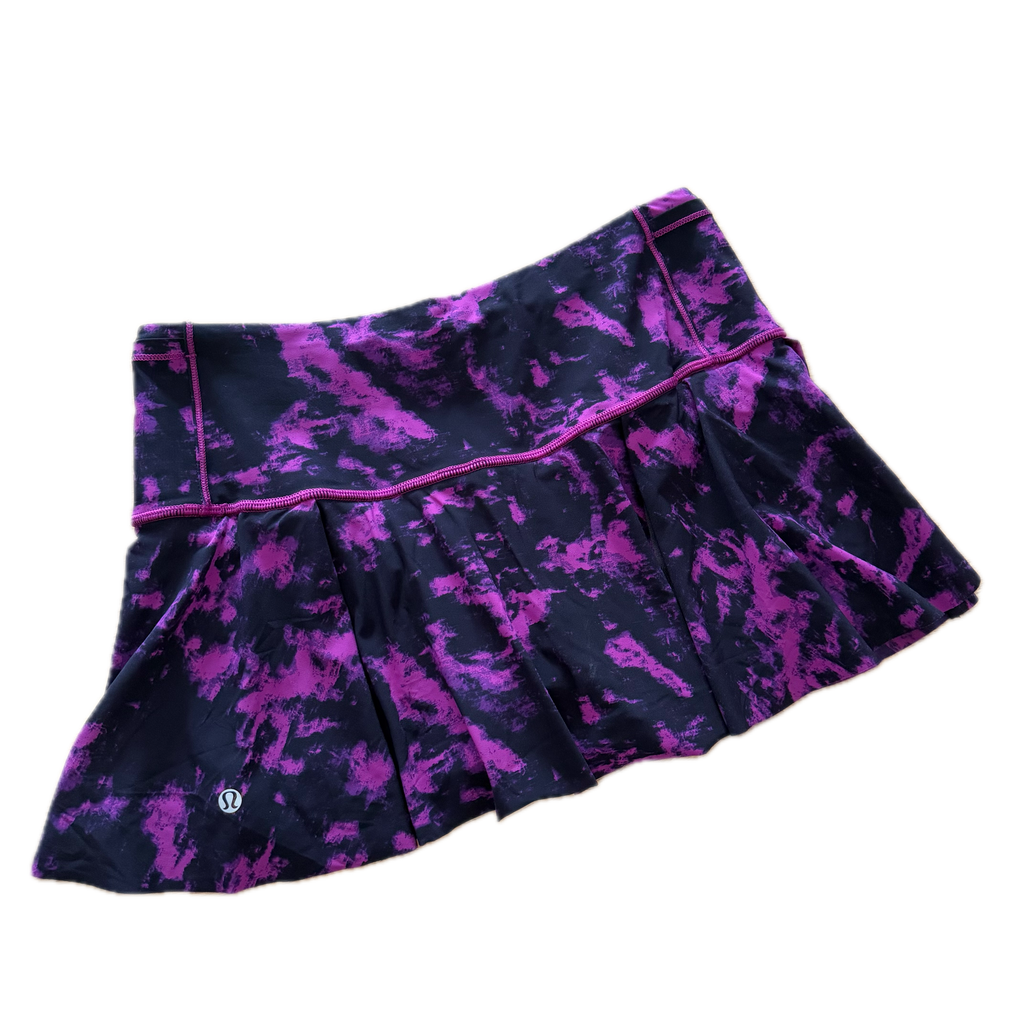 Falda talla 6 estampado morado con negro