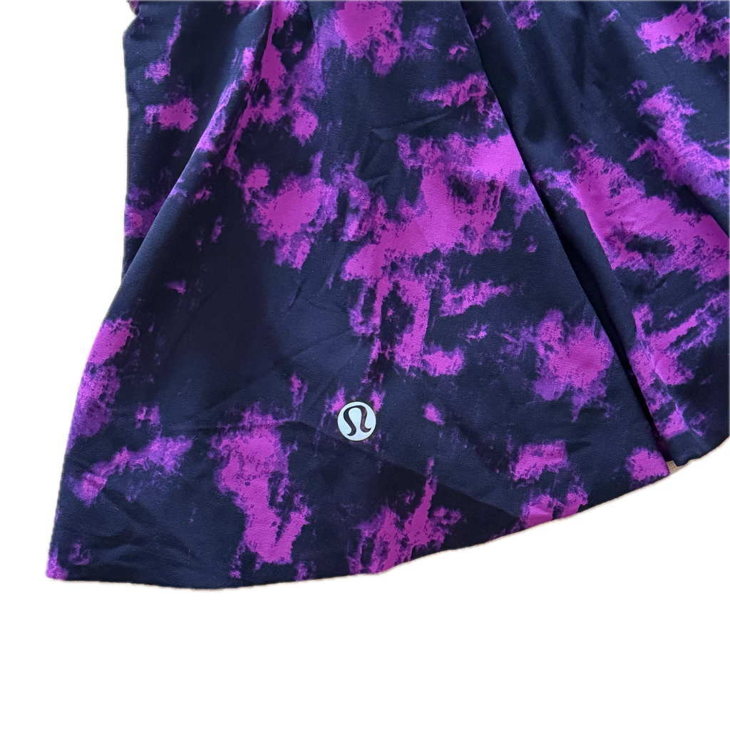Falda talla 6 estampado morado con negro