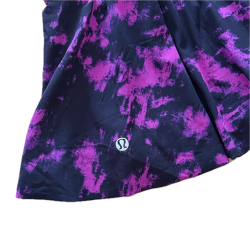 Falda talla 6 estampado morado con negro