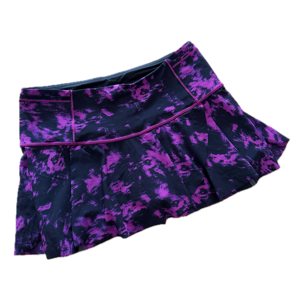 Falda talla 6 estampado morado con negro