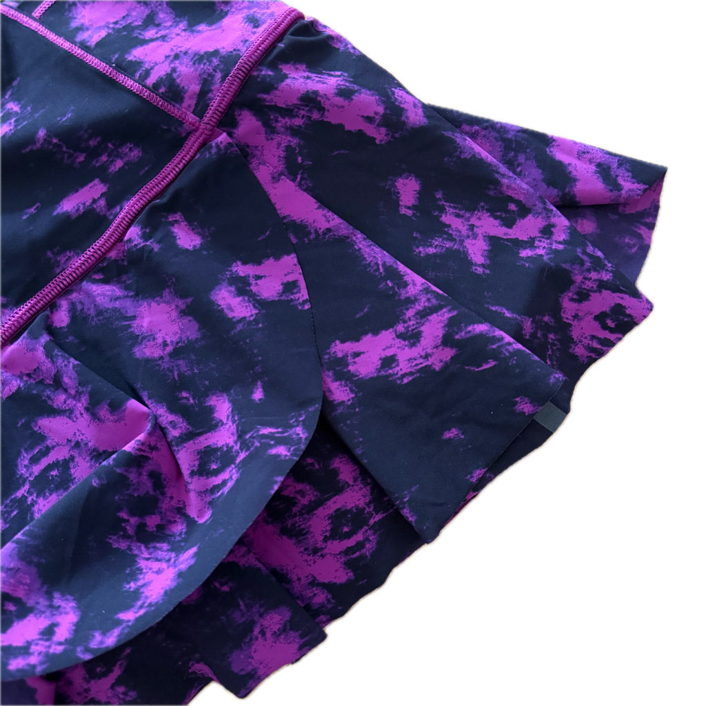 Falda talla 6 estampado morado con negro