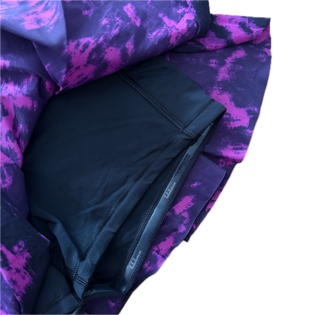 Falda talla 6 estampado morado con negro
