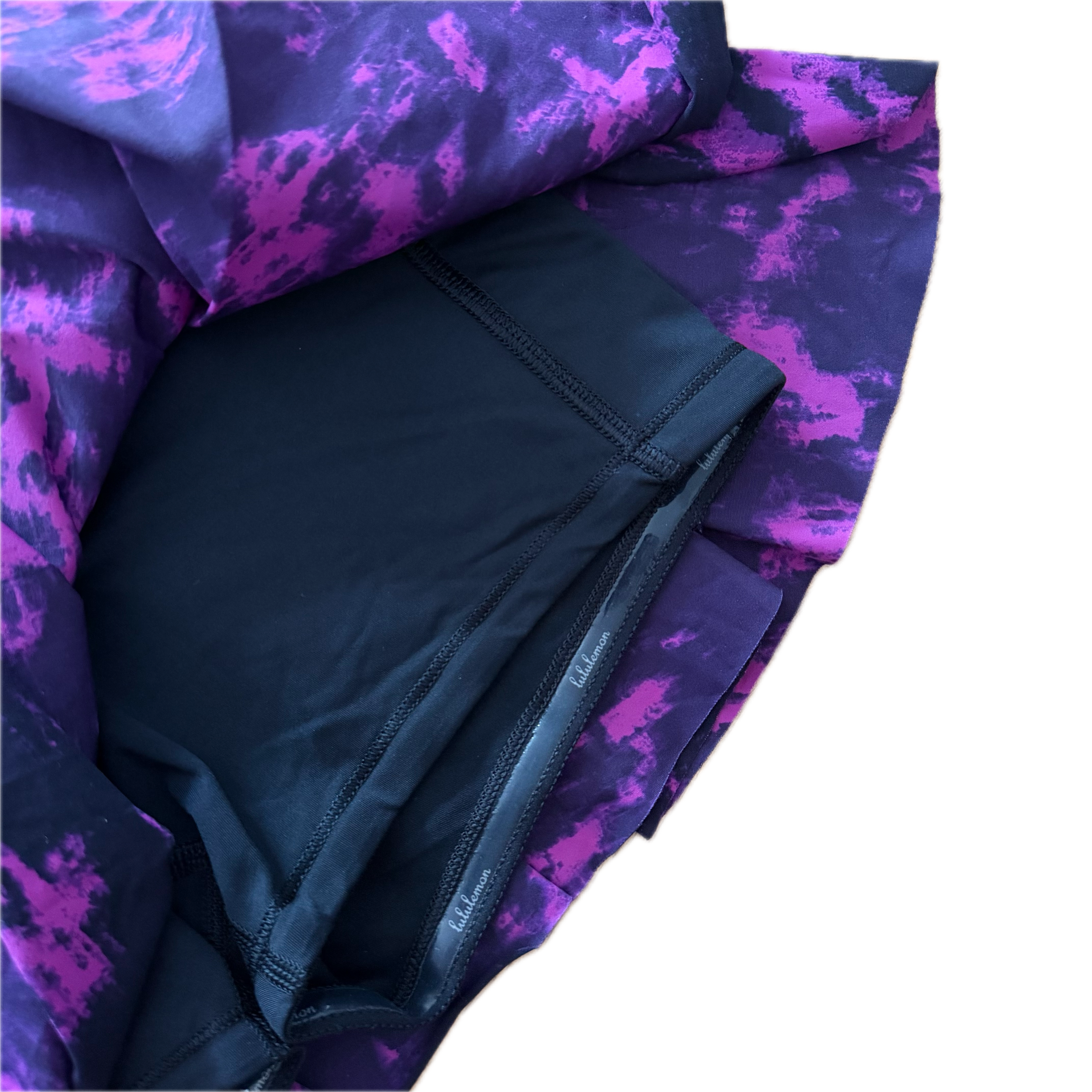 Falda talla 6 estampado morado con negro