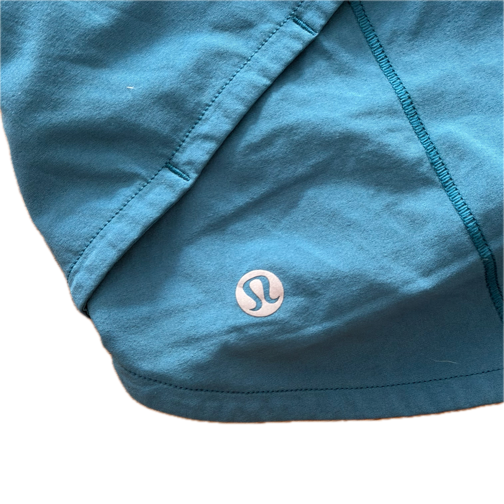 Short running talla 4 azul aqua