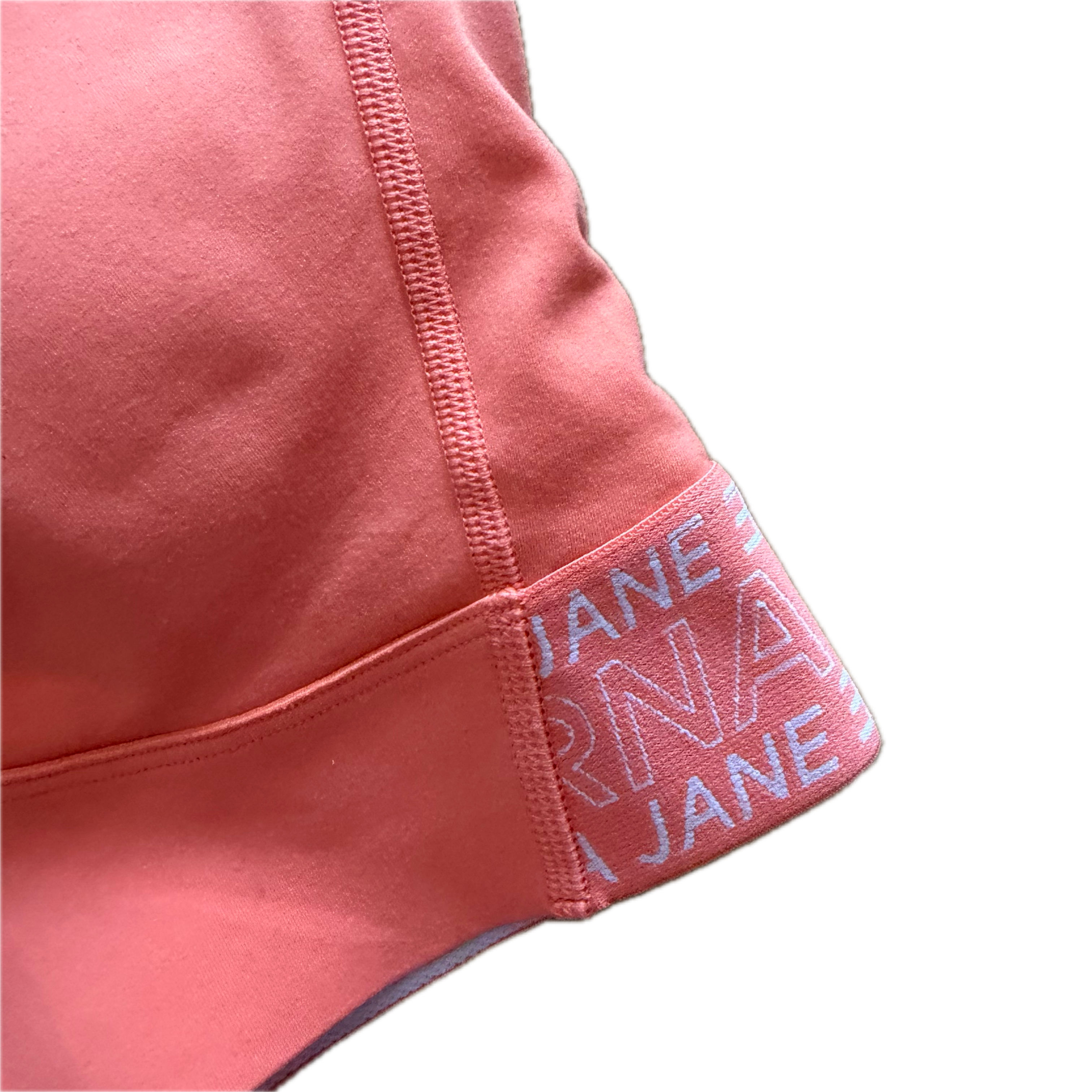 Top talla M coral soporte medio/alto