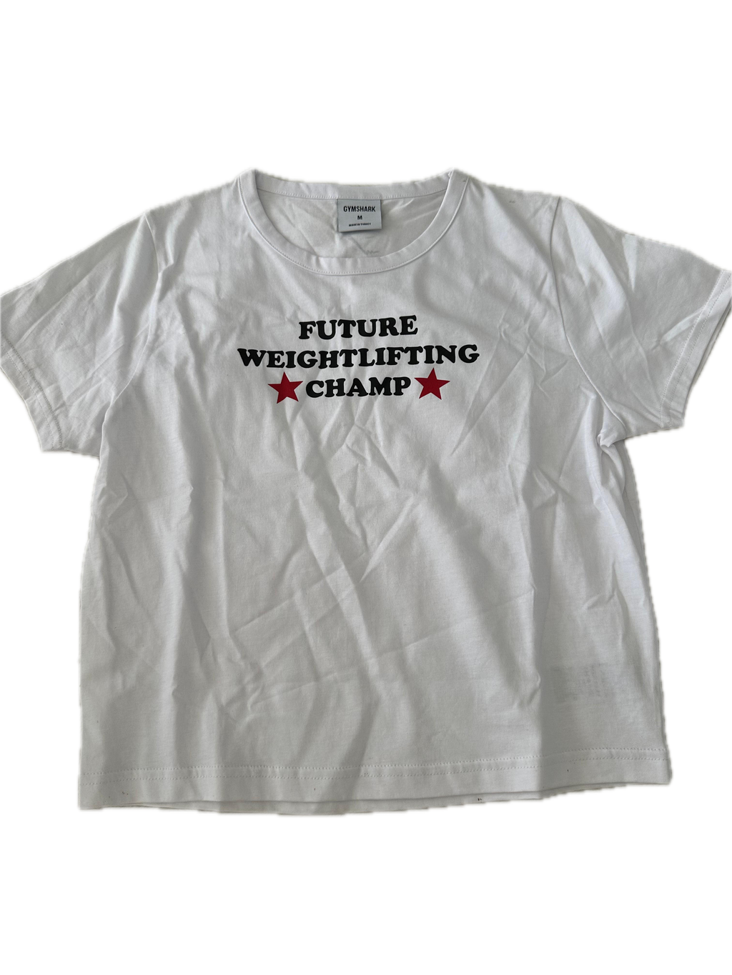 Playera talla M blanca con letras CHAMP